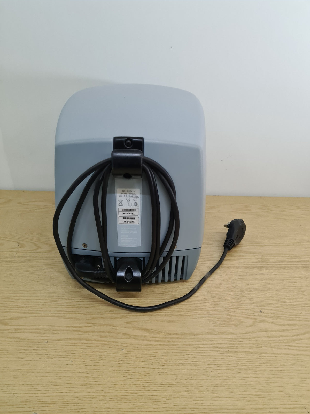 Respironics CoughAssist CA-3200 rear label and mains cable