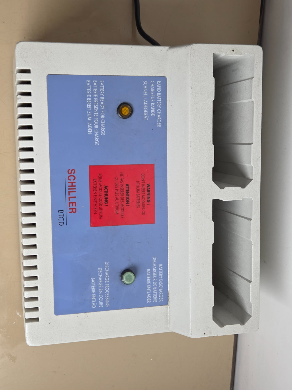 Schiller BTCD charger front panel and battery bays