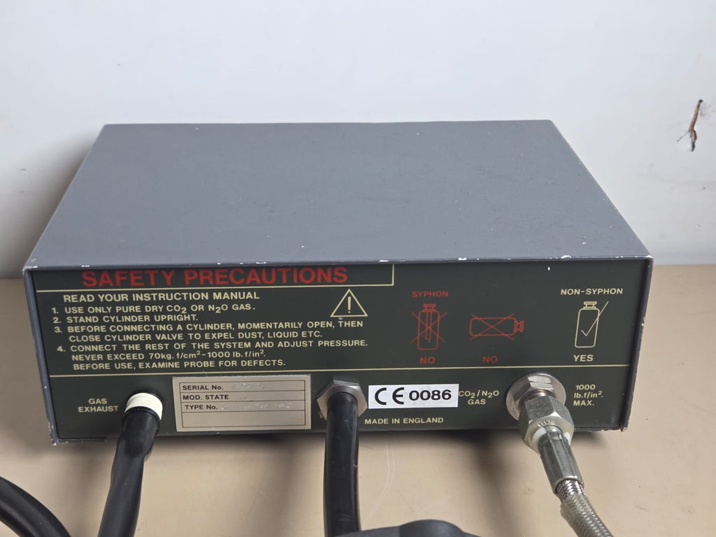 Rear panel of Spembly Medical 140 Cryo Unit with gas connections and safety instructions
