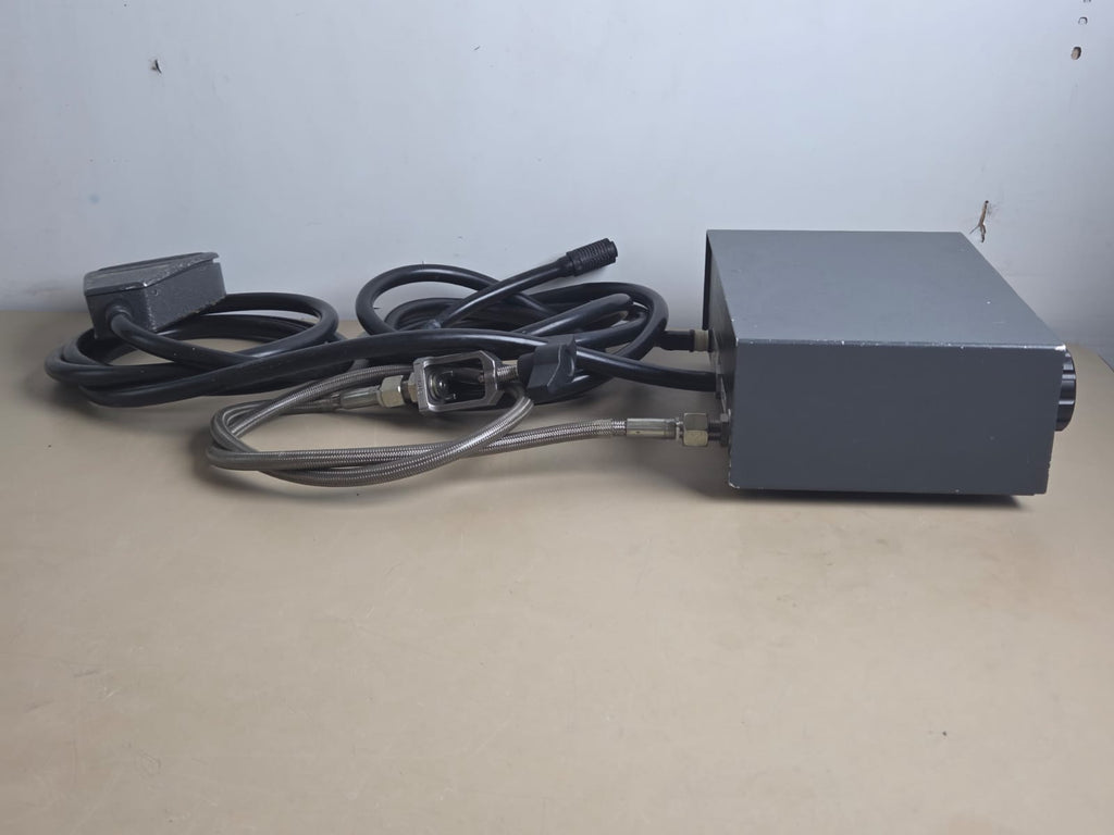 Side view of Spembly Medical 140 Cryo Unit with cables and gas hose