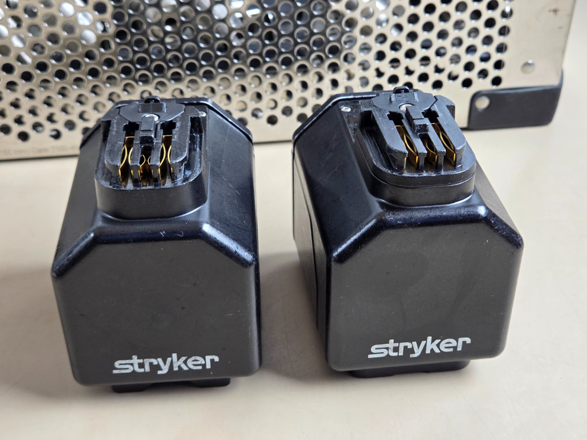 Two Stryker SmartLife large aseptic battery housings