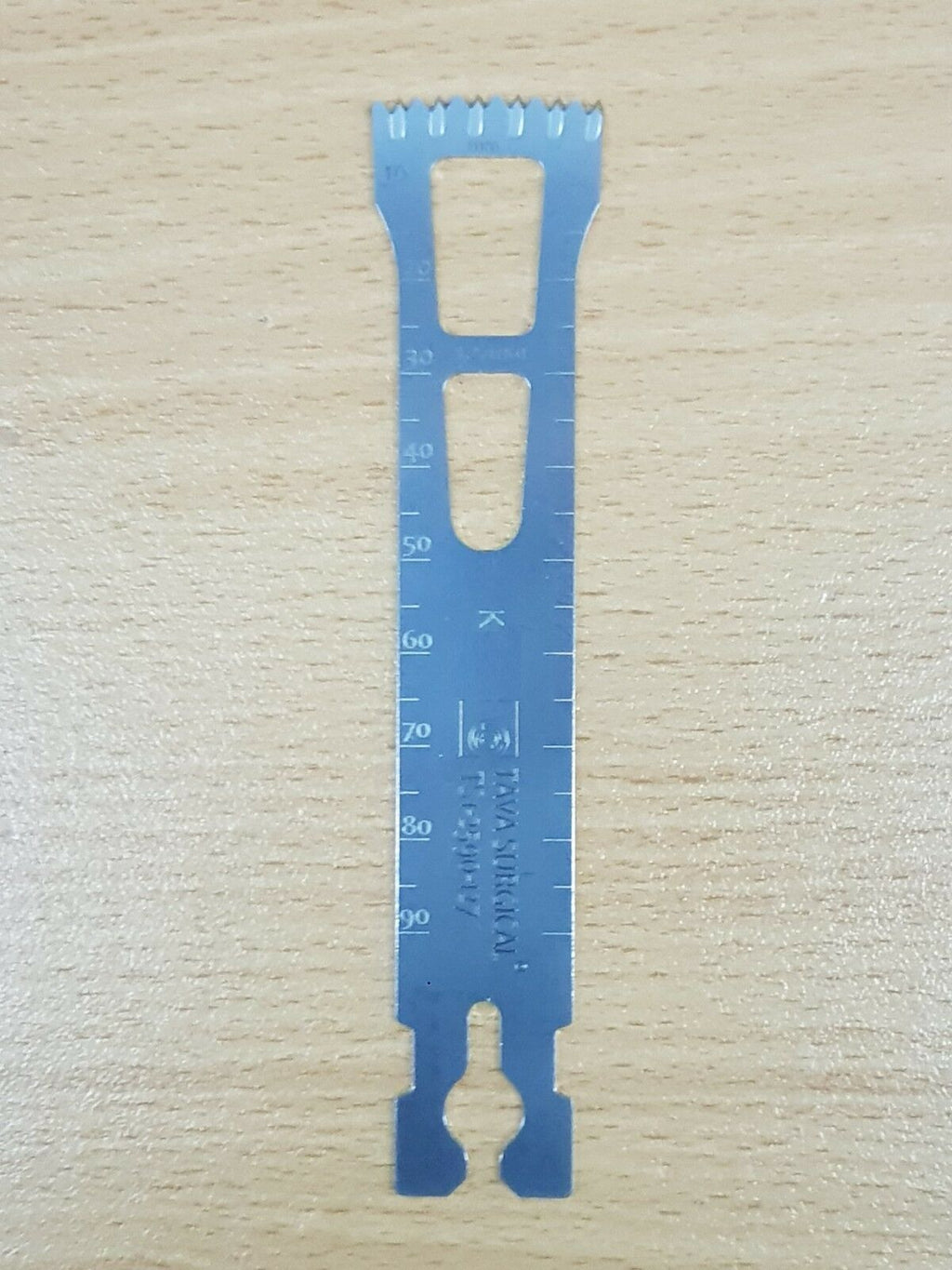 Stryker surgical saw blade with millimetre measurement scale
