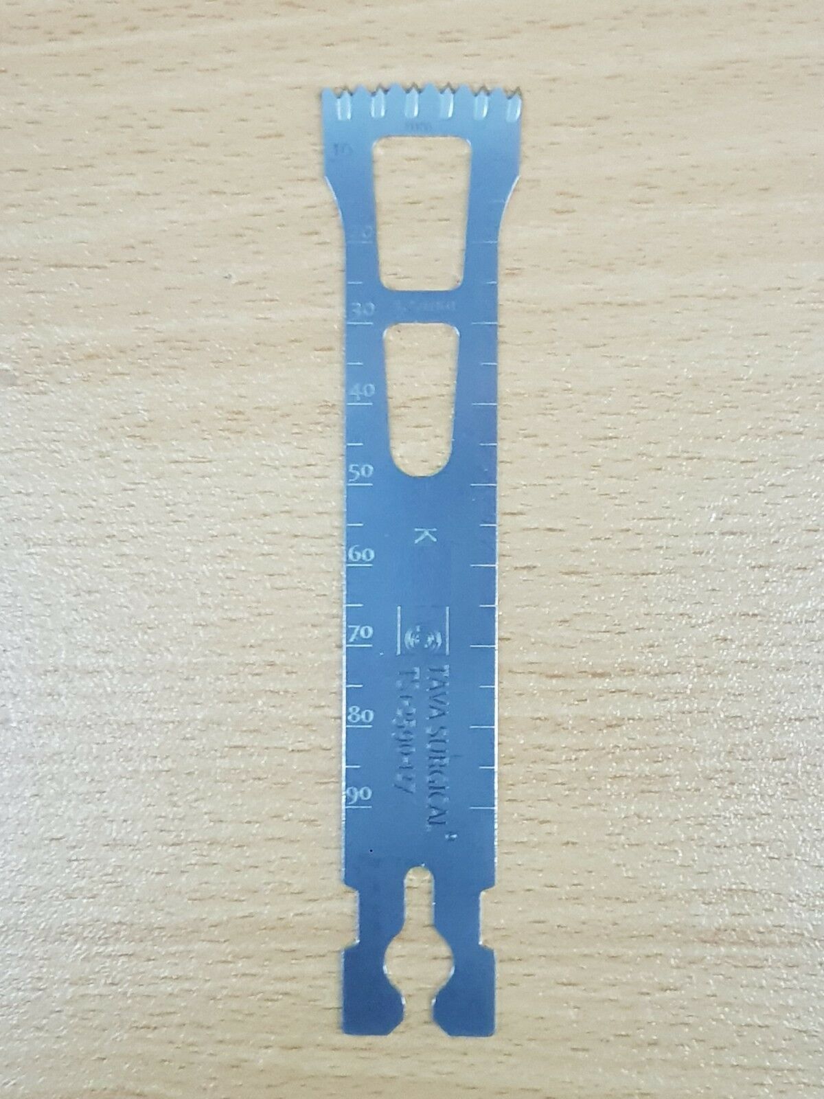Stryker surgical saw blade with millimetre measurement scale