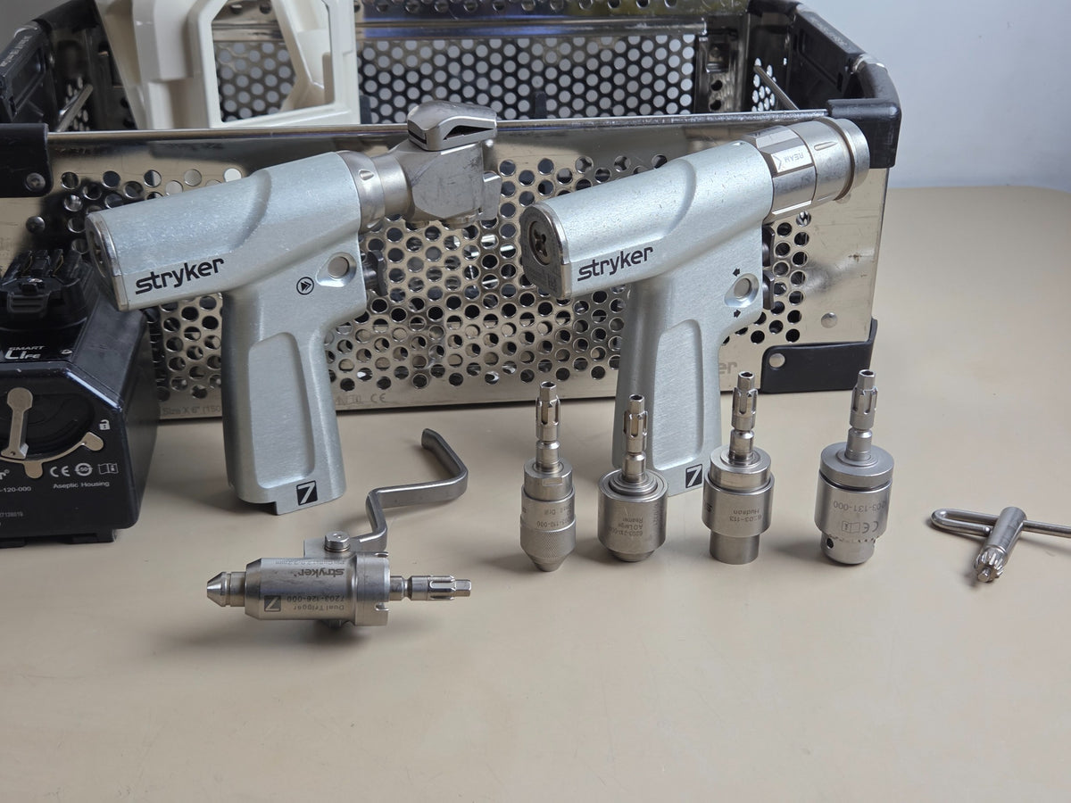 Stryker System 7 dual trigger rotary and sagittal saw handpieces with attachments