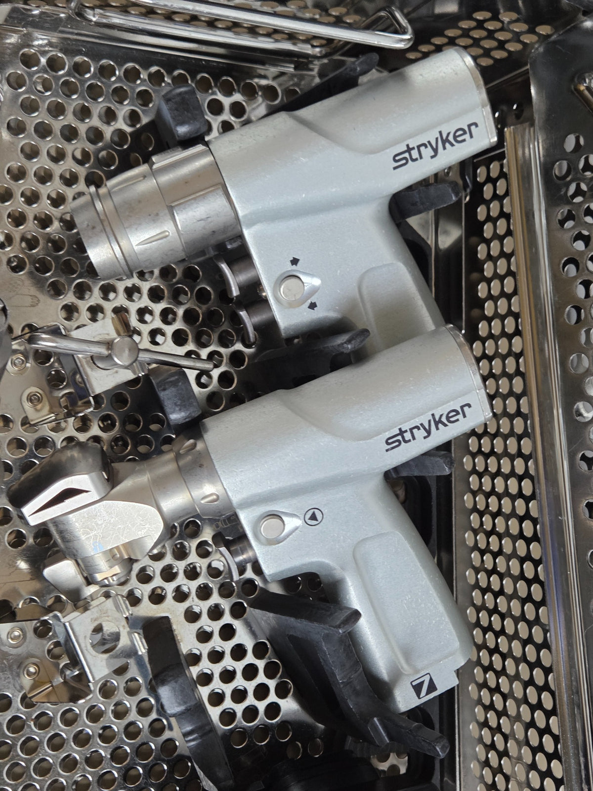 Two Stryker System 7 handpieces in sterilization case