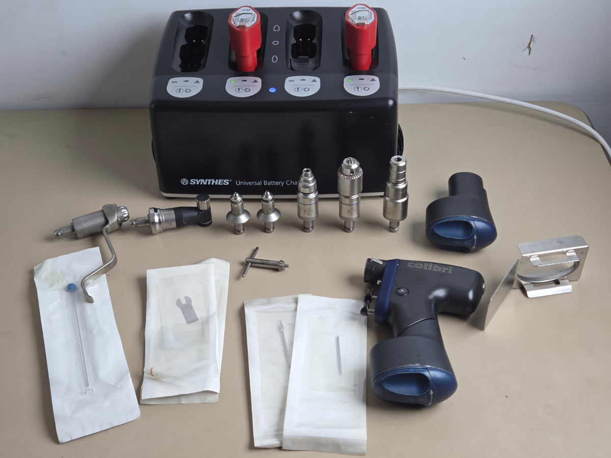 Synthes Colibri 532.001 surgical drill complete set with charger, batteries and attachments