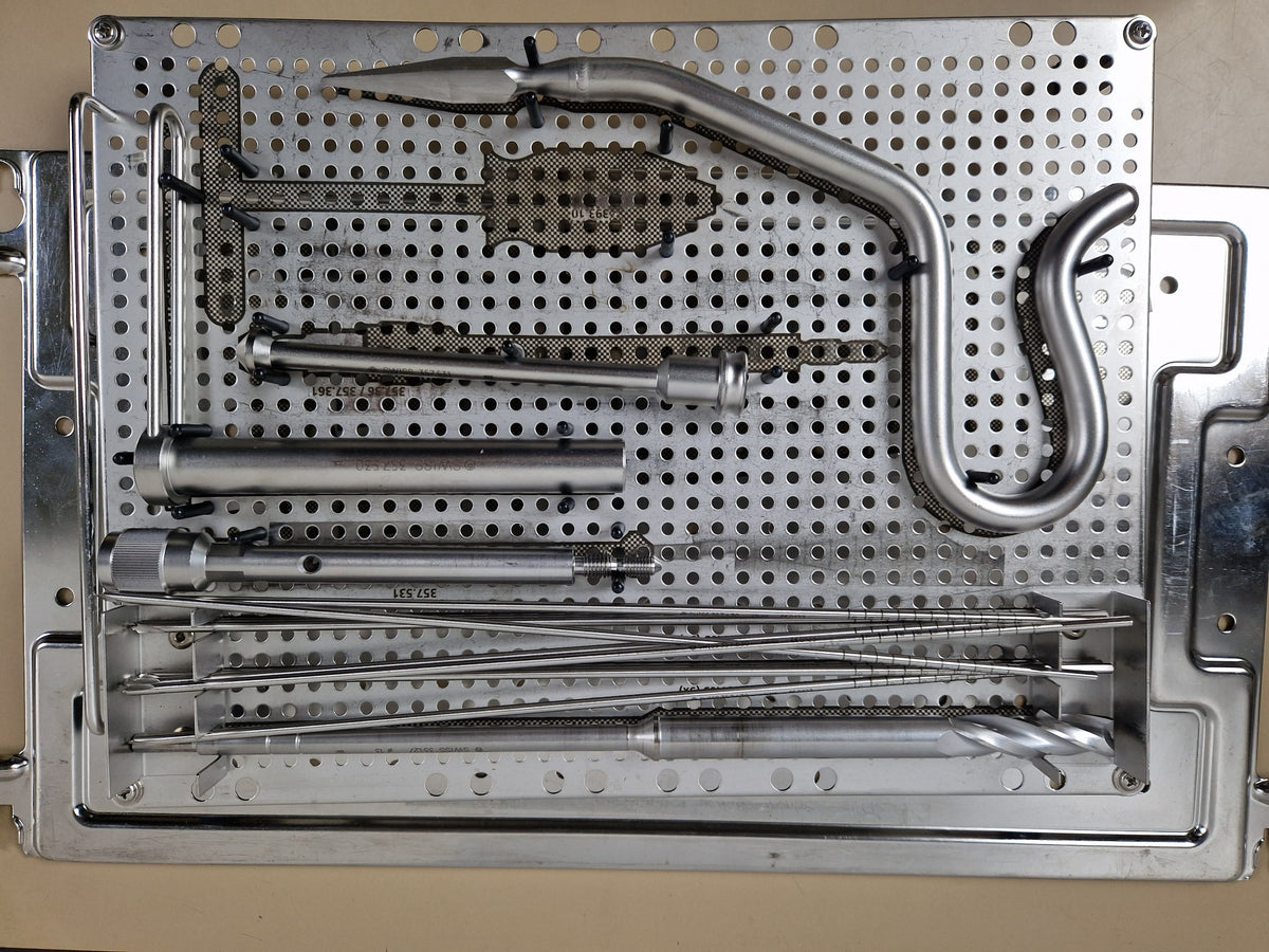 Synthes femoral nail instruments arranged in sterilisation tray