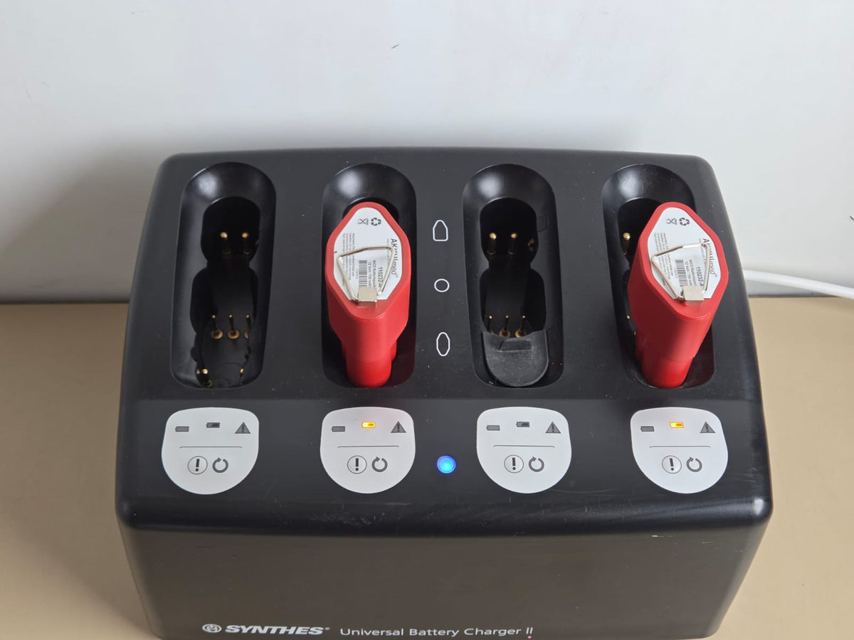 Synthes Universal Battery Charger II with two Colibri batteries