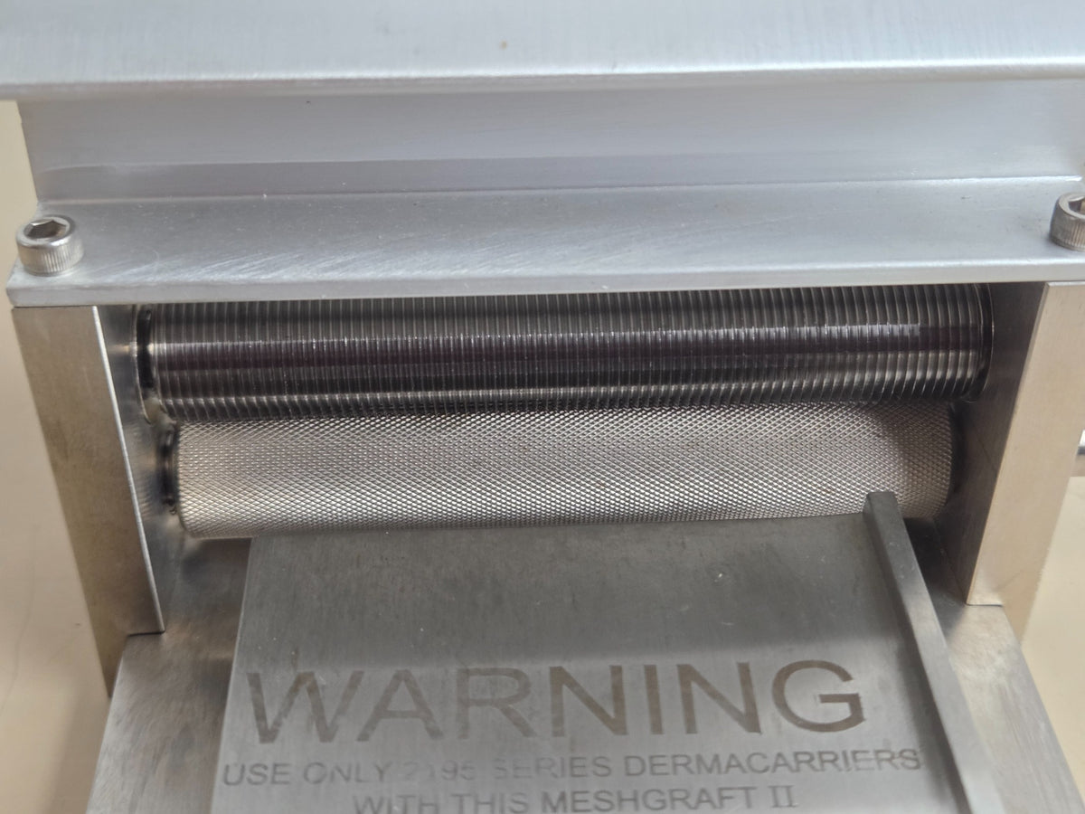 Zimmer Meshgraft II feed roller and cutter area